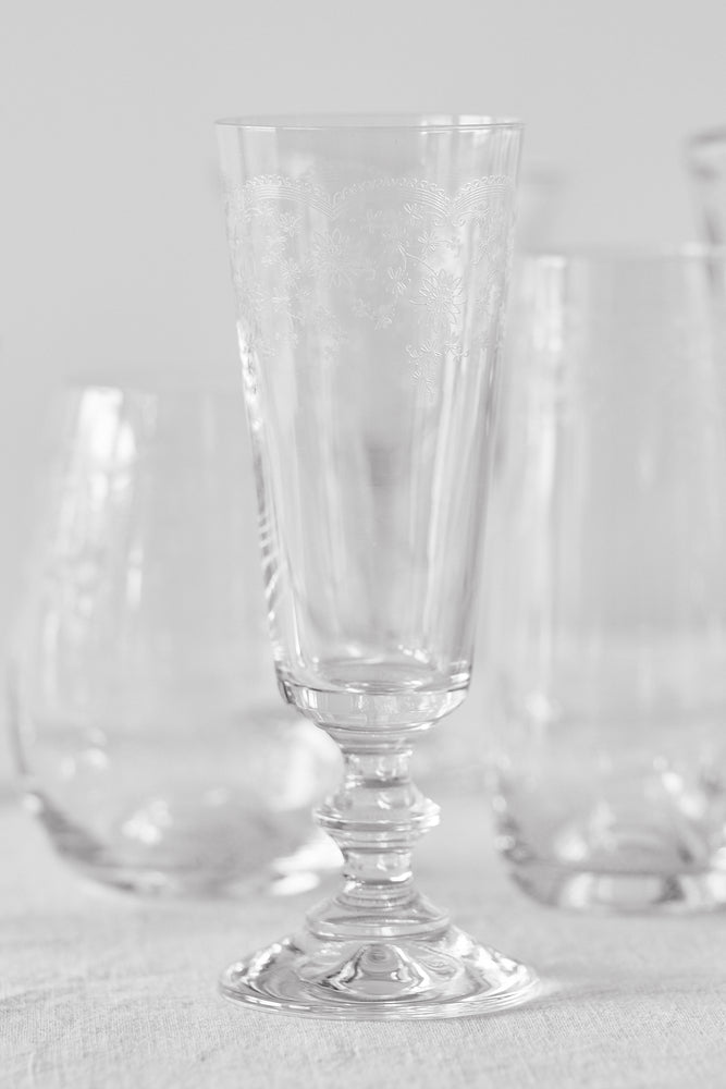 
                  
                    Etched Floral Champagne Glasses
                  
                