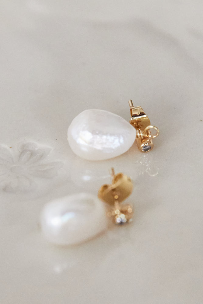 
                  
                    Pearly Earrings
                  
                