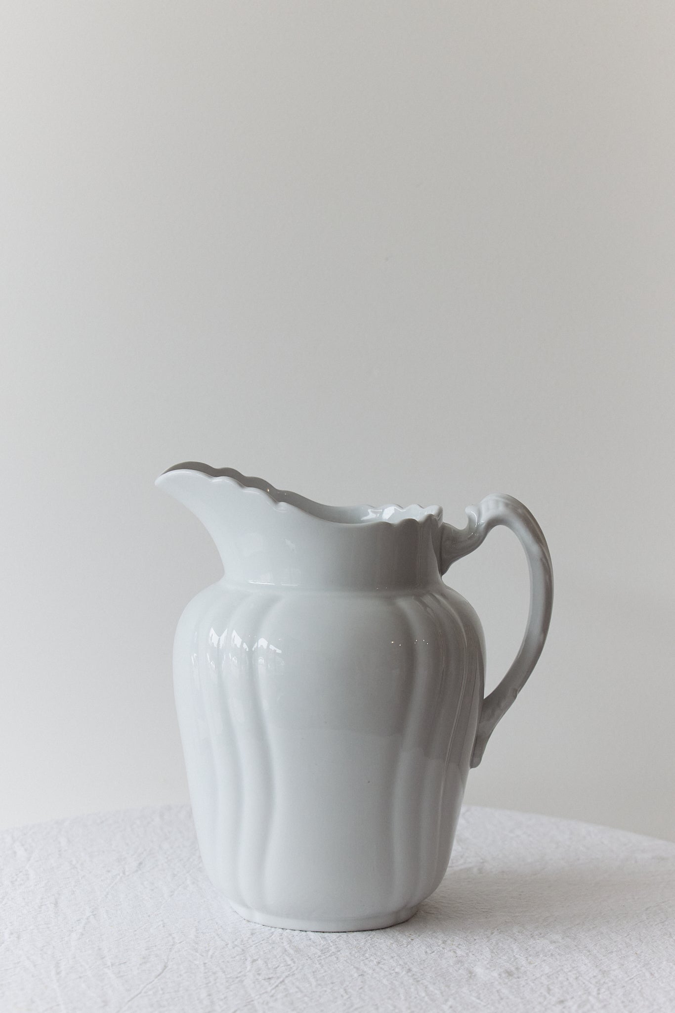 
                  
                    Vintage Porcelain Pitcher
                  
                