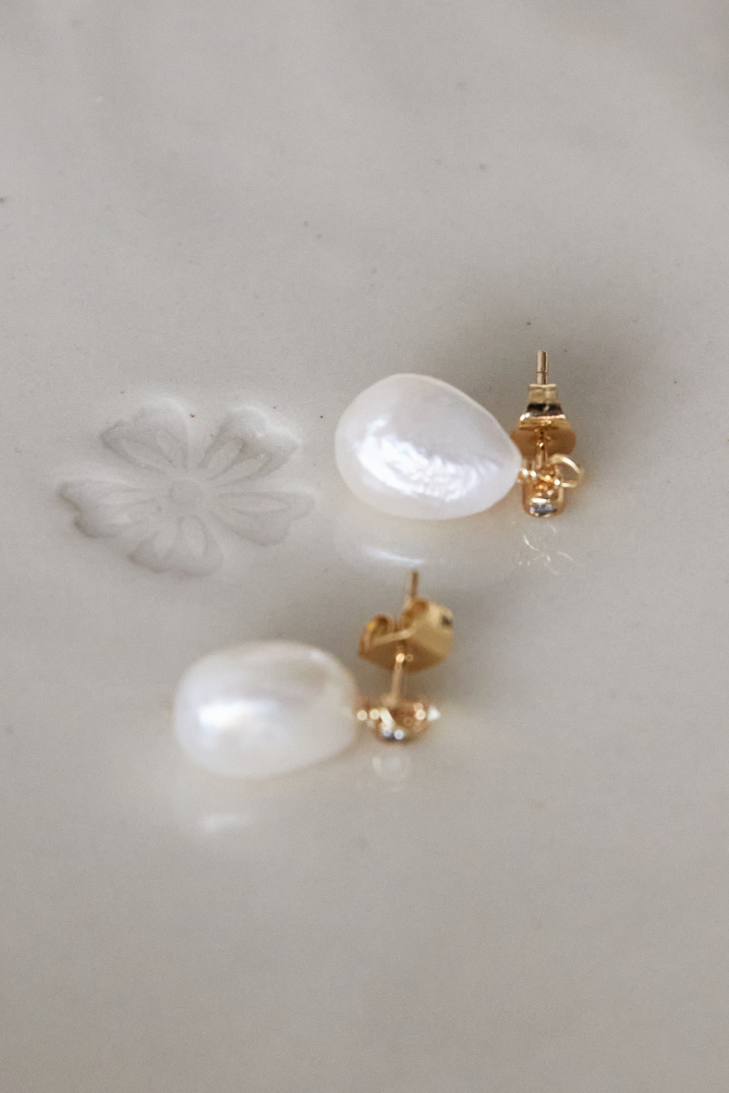 
                  
                    Pearly Earrings
                  
                